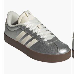 adidas Metallic Silver and Cream Sneakers
New without tags, no box.